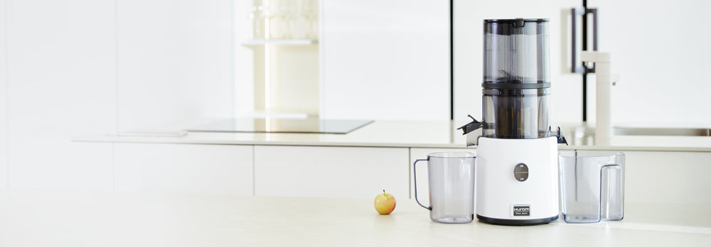 White kitchen appliance on a white countertop with a blurred background H330P