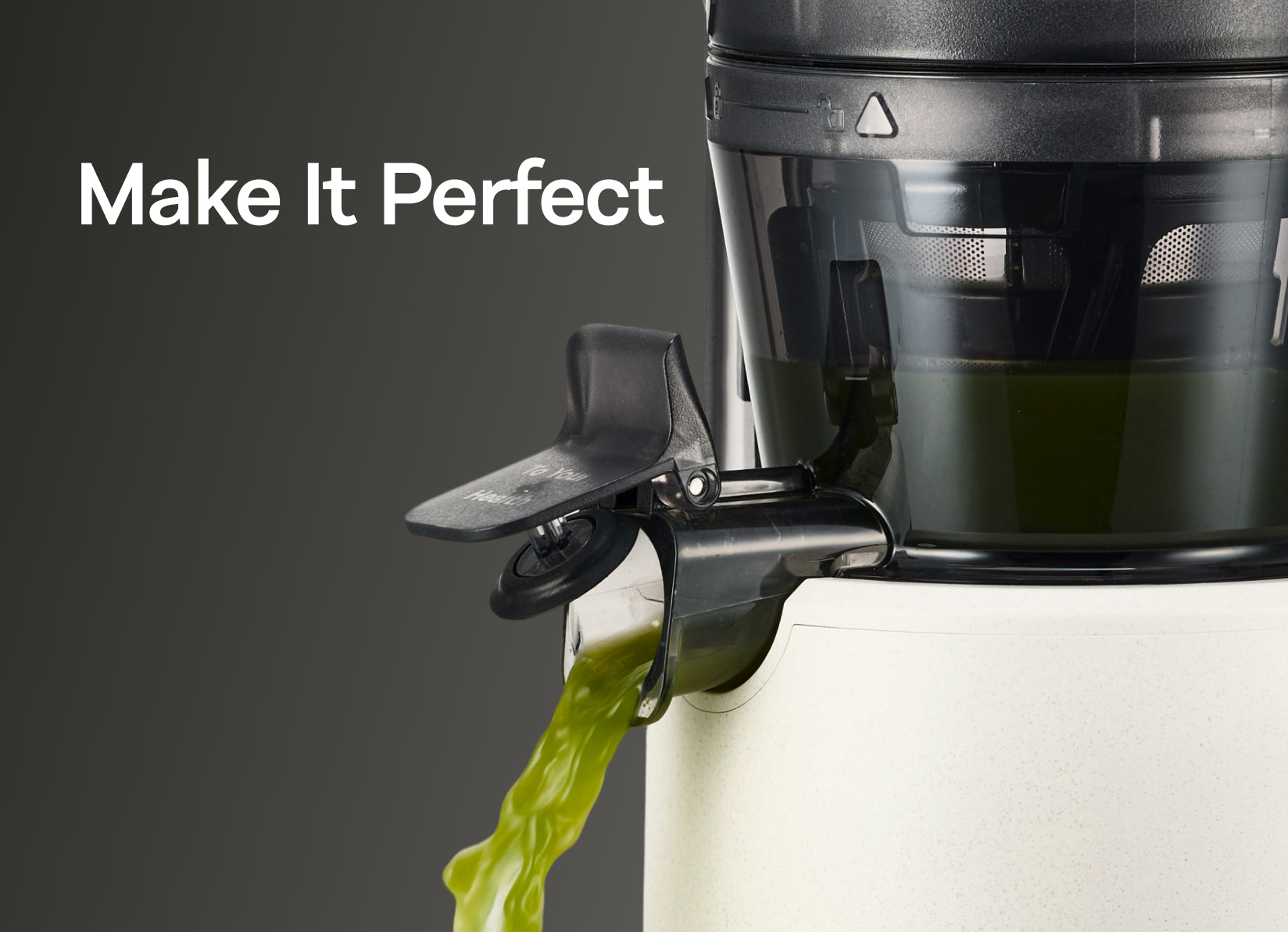 A close-up of a Hurom Pure Series slow juicer, showing a pure green juice stream pouring from the spout. With the text "Make It Perfect" in the upper left, this image represents the brand's dedication to perfect nutrient preservation and original, authentic taste.